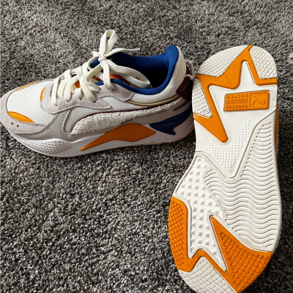 Multiple colored puma shoe